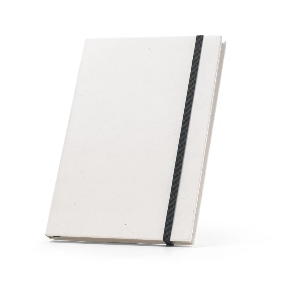 Caderno A5,produzido através de pacotes de leite reciclados com folhas pautadas recicladas, com 160 páginas pautadas recicladas