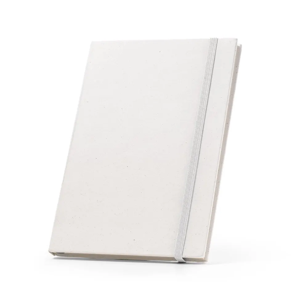 Caderno A5,produzido através de pacotes de leite reciclados com folhas pautadas recicladas, com 160 páginas pautadas recicladas