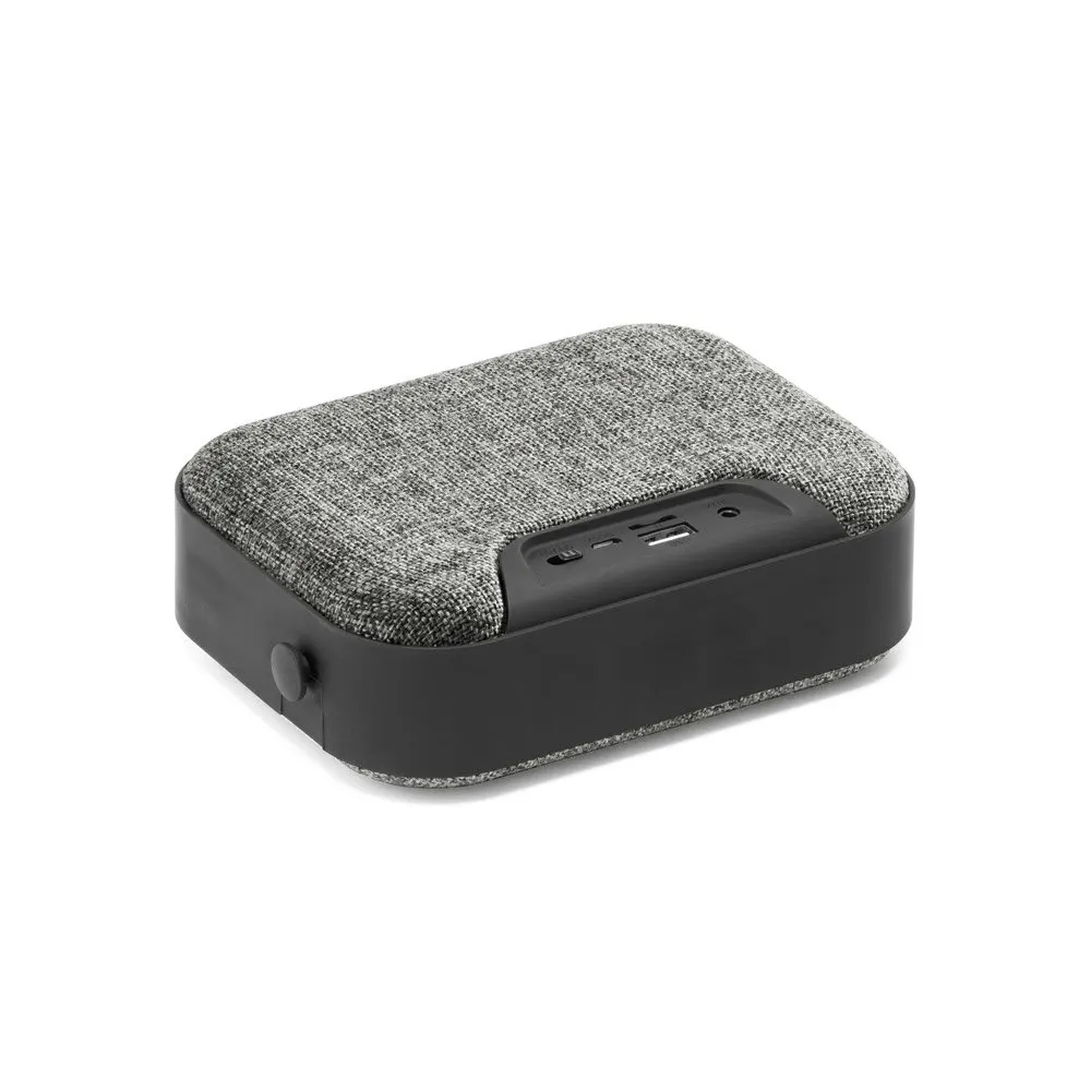 Caixa de som portátil em ABS, tecido em poliéster e acabamento em borracha 1’200 mAh